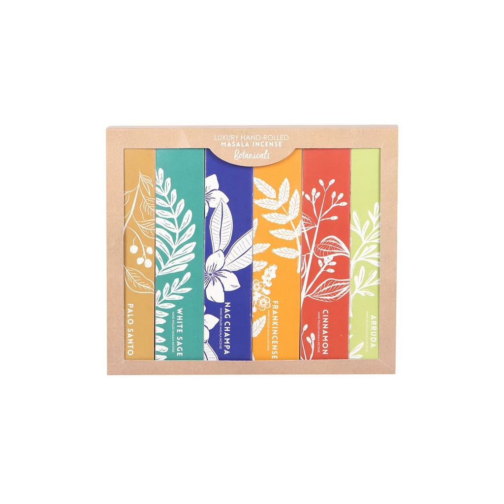 Set of incense sticks with colorful packaging on a white background