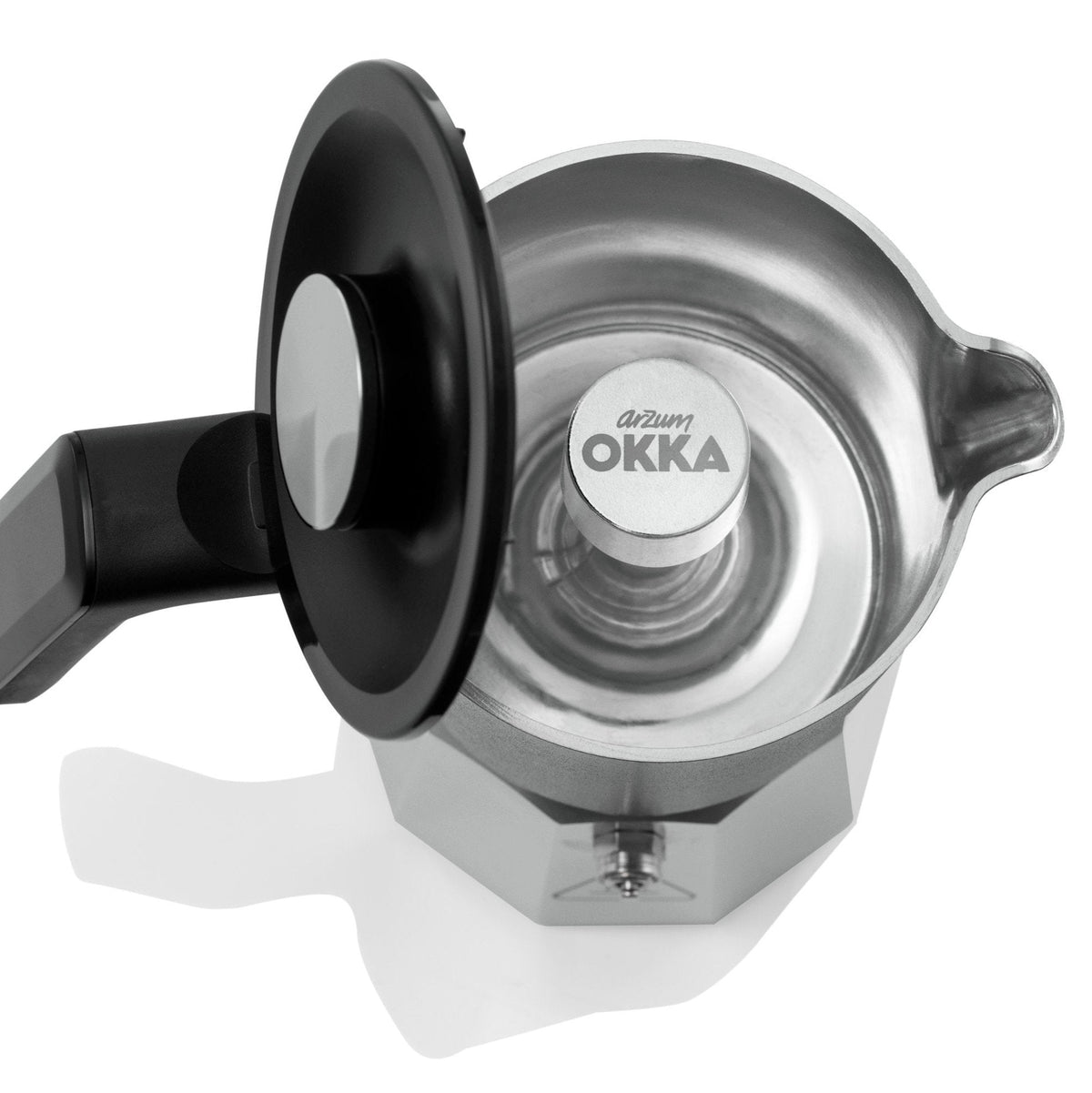 Stainless steel espresso maker with black handle on a white background, featuring the OKKA brand.