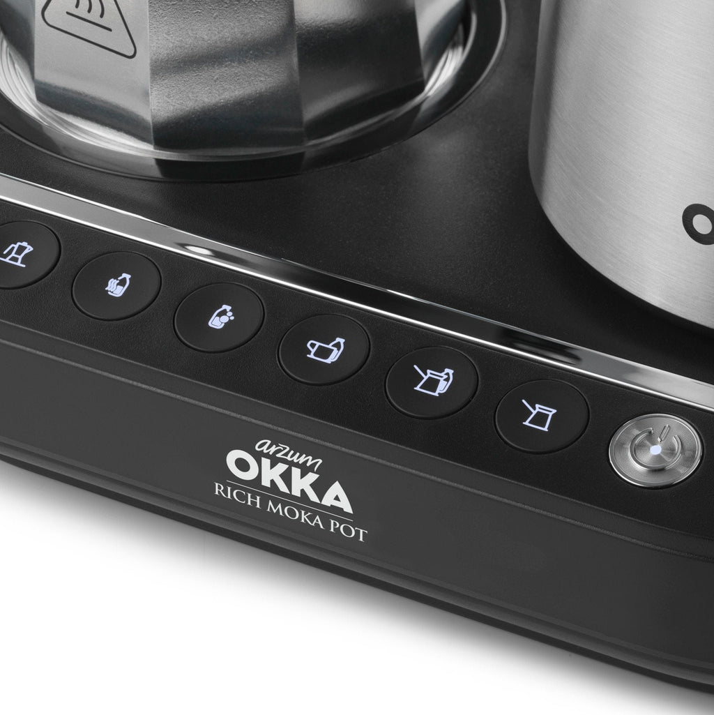 Close-up of a Rich Moka Pot with brand name on control panel