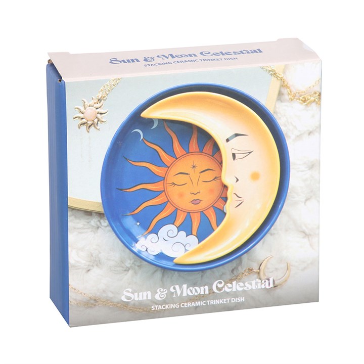 Box packaging of a sun and moon design ceramic trinket dish with decorative elements.