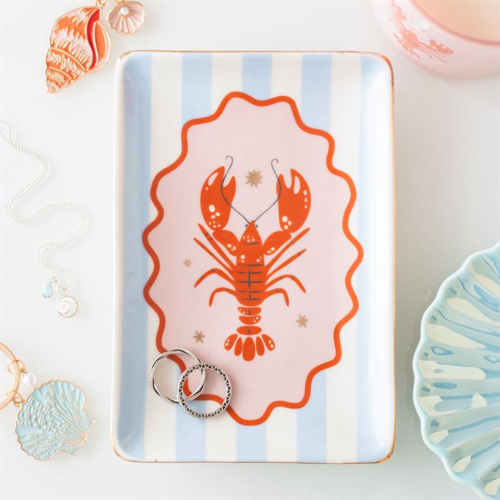 Rectangular plate with a red lobster design on a striped background