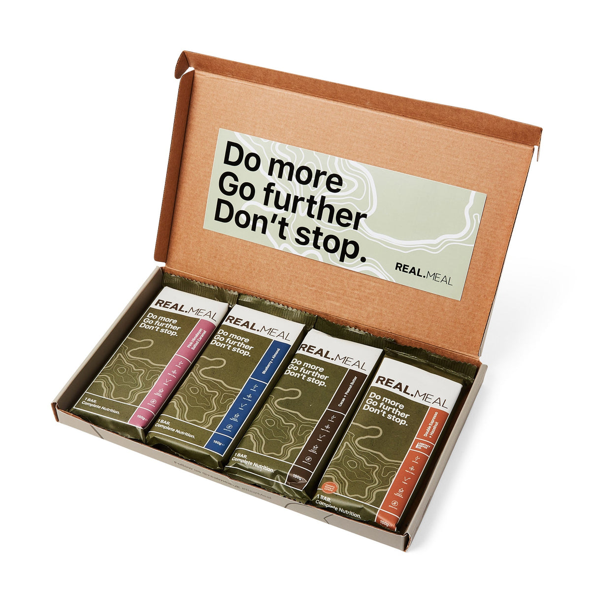 Box of Real Meal bars with motivational quote on a white background