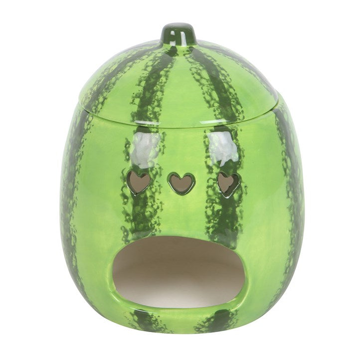 Green watermelon-shaped candle holder on a white background